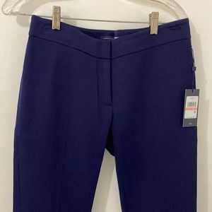 TH navy, flat front with two back pockets.